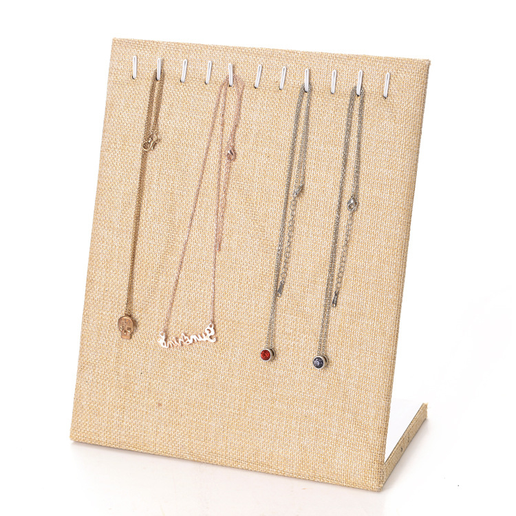 Vertikāls L-formas juvelierizstrādājumu stends auskarām un kaklariem — samta apvalks, kompozītmateriāls, mākslas vēja stils