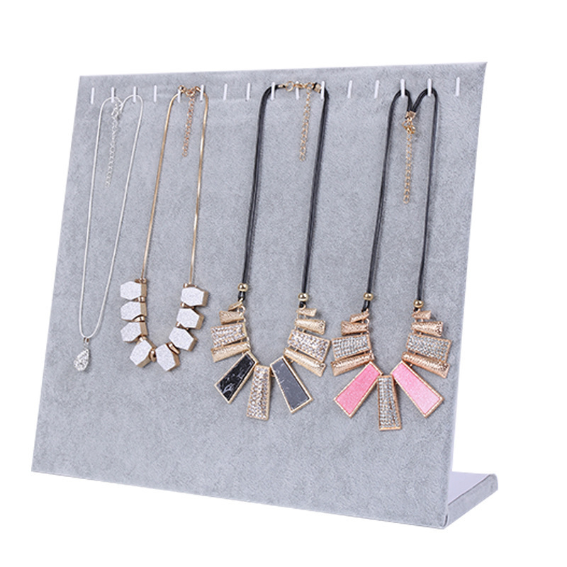 Vertikāls L-formas juvelierizstrādājumu stends auskarām un kaklariem — samta apvalks, kompozītmateriāls, mākslas vēja stils