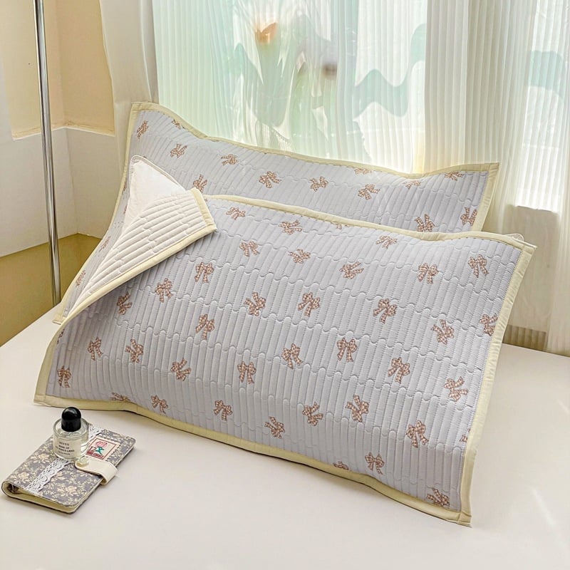 Kokvilnas spilvendrāna ar kvilētu šuvumu, vairāk nekā 95% kokvilnas, 40s audums, reaktīvā krāsošana