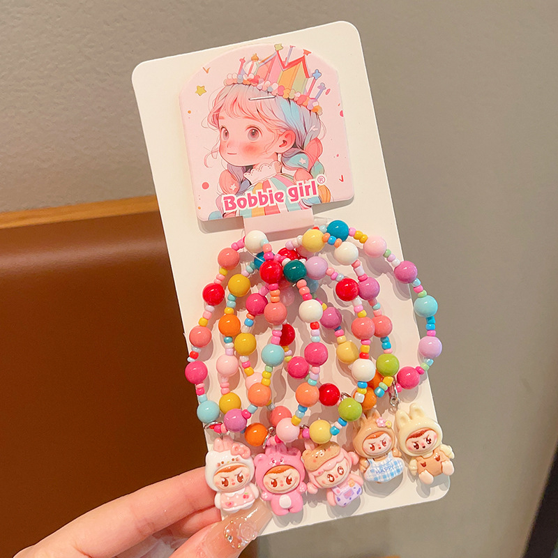 Kézzel készített gyerek karkötő műanyag/gyanta anyagból, rajzfilmszerű figurával, koreai stílusú, 5 darabos Princess sorozat, egyenként csomagolva.