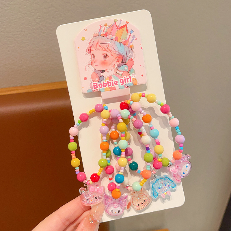 Kézzel készített gyerek karkötő műanyag/gyanta anyagból, rajzfilmszerű figurával, koreai stílusú, 5 darabos Princess sorozat, egyenként csomagolva.