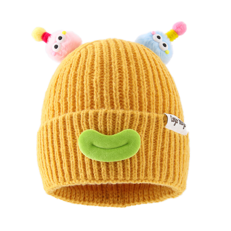Kötött baba sapka fülvédővel, aranyos csápokkal és bolyhos pomponokkal, cartoon mosolygó arc, meleg akril szálból, 0–12 hónapos korosztály, téli 2025