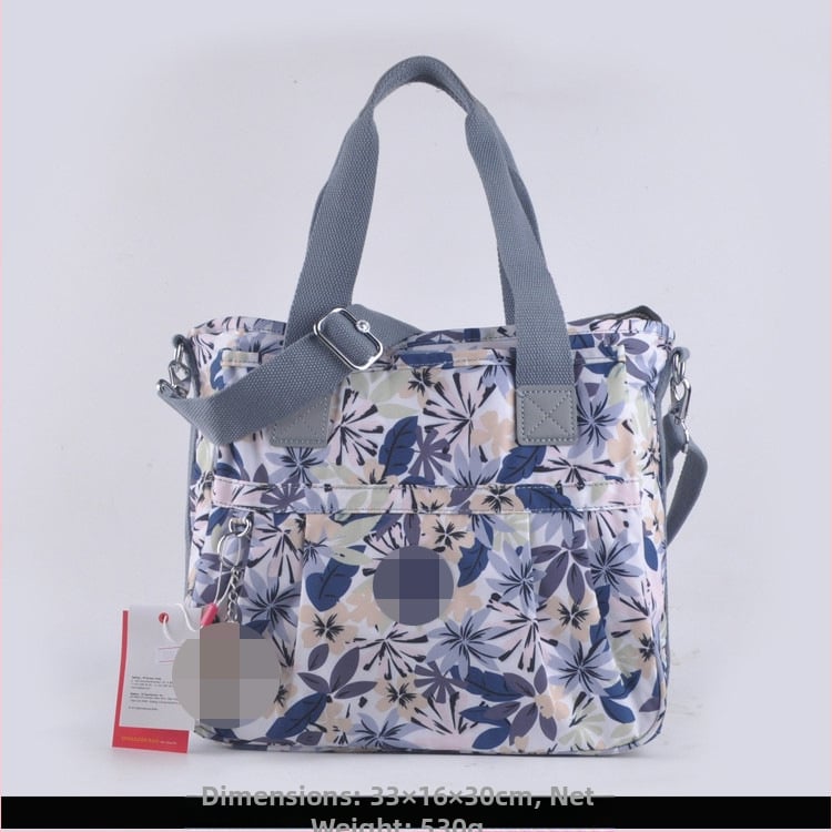 Õla kott crossbody – nailon, horisontaalne ruudu kuju, tõmblukukatte avamine, sisetaskud: tõmblukutasku, telefonitasku, ID-tasku, laminaat-tõmbluktasku, kaamera-tasku, vooder nailon