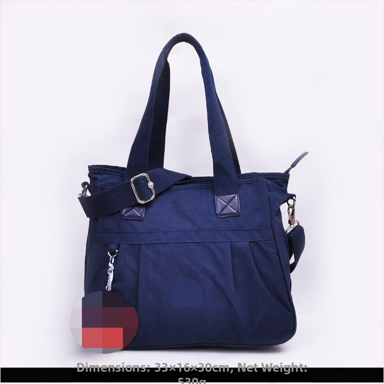 Õla kott crossbody – nailon, horisontaalne ruudu kuju, tõmblukukatte avamine, sisetaskud: tõmblukutasku, telefonitasku, ID-tasku, laminaat-tõmbluktasku, kaamera-tasku, vooder nailon