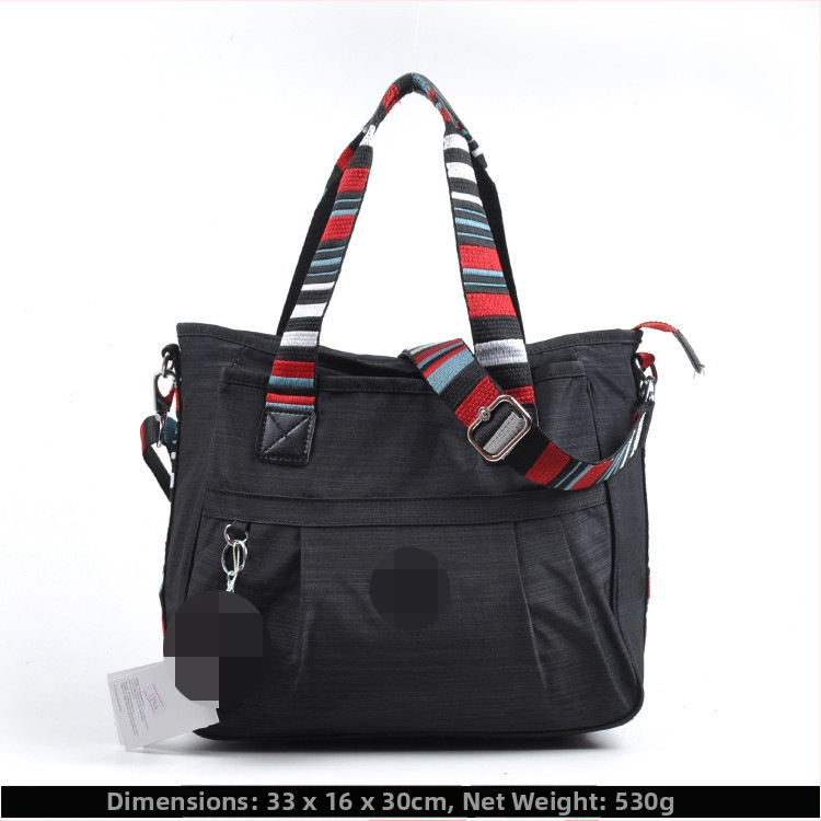 Õla kott crossbody – nailon, horisontaalne ruudu kuju, tõmblukukatte avamine, sisetaskud: tõmblukutasku, telefonitasku, ID-tasku, laminaat-tõmbluktasku, kaamera-tasku, vooder nailon