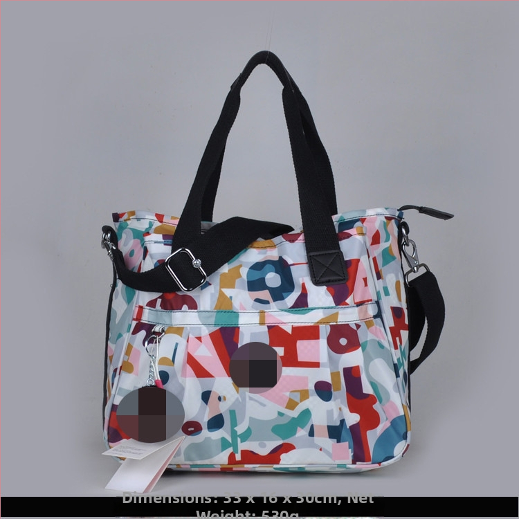 Õla kott crossbody – nailon, horisontaalne ruudu kuju, tõmblukukatte avamine, sisetaskud: tõmblukutasku, telefonitasku, ID-tasku, laminaat-tõmbluktasku, kaamera-tasku, vooder nailon