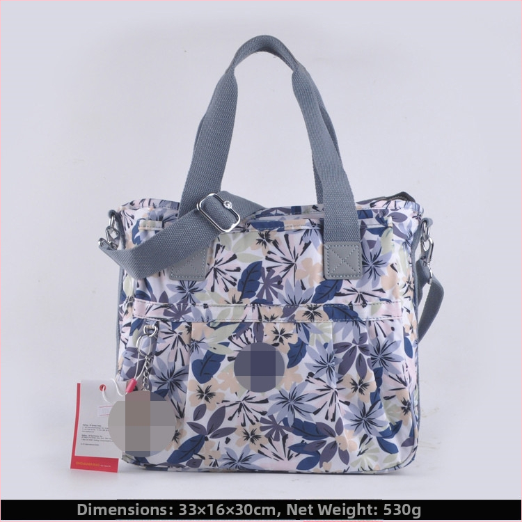 Õla kott crossbody – nailon, horisontaalne ruudu kuju, tõmblukukatte avamine, sisetaskud: tõmblukutasku, telefonitasku, ID-tasku, laminaat-tõmbluktasku, kaamera-tasku, vooder nailon