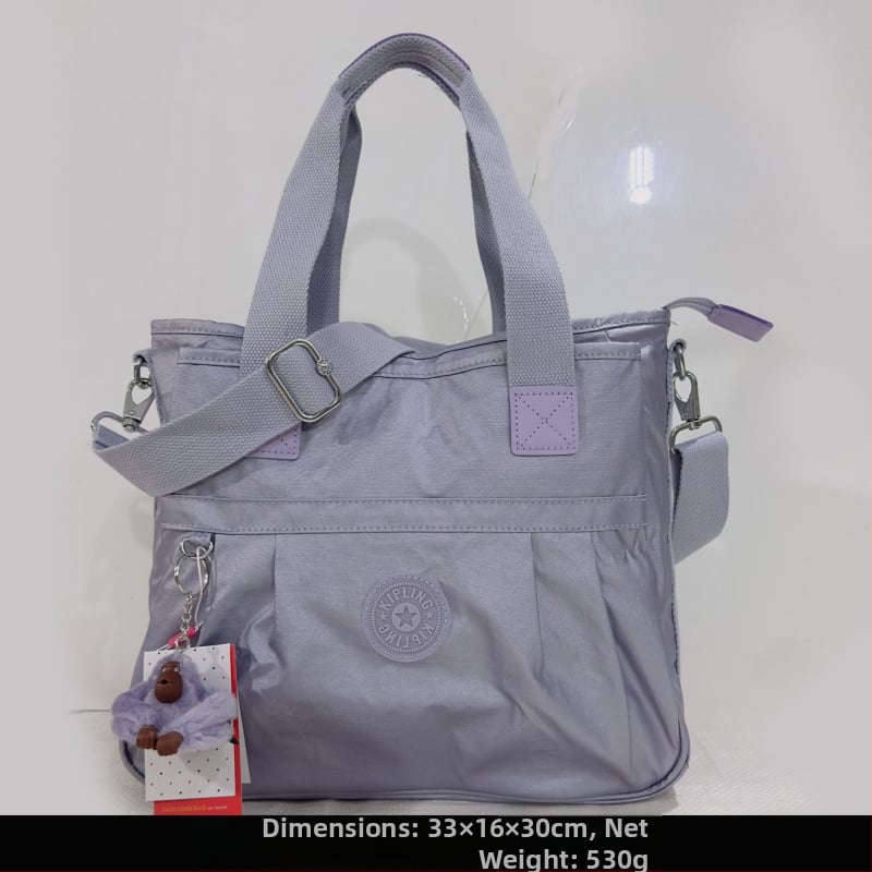 Õla kott crossbody – nailon, horisontaalne ruudu kuju, tõmblukukatte avamine, sisetaskud: tõmblukutasku, telefonitasku, ID-tasku, laminaat-tõmbluktasku, kaamera-tasku, vooder nailon