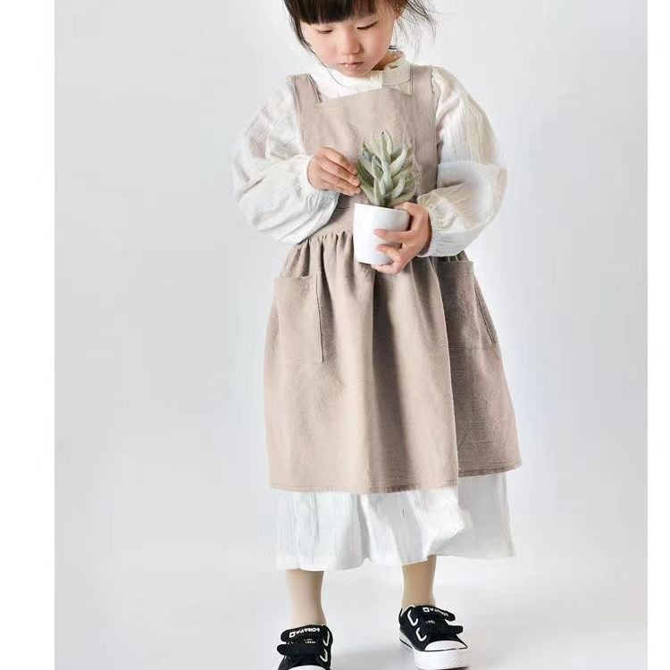 Priekšauts no 100% kokvilnas, bez piedurknēm, traipu izturīgs, svaigs stils, vienkrāsains dizains