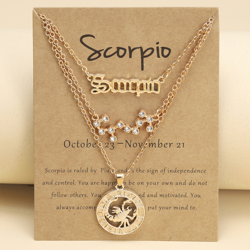 12 csillagjegyű nyaklánc, retro stílusú medállal, csillagképpel, keresztezett lánc, ötvözet anyagú, hossz 47–56 cm, három darabos ékszerszett