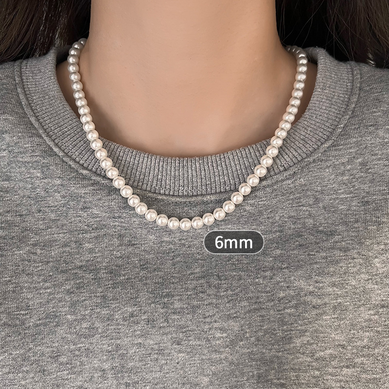 Gyöngy nyaklánc gyöngyház medállal, U-formájú kialakítás, Seiko kezelés, egyszerű, texturált, könnyed luxus stílus