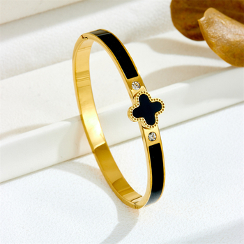 Sieviešu rokassprādze no titāna tērauda, minimālistisks dizains, elektroplatinēts pārklājums, četrlapu zieda motīvs, svars 0.01