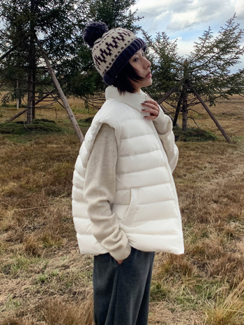 Sieviešu pūkve veste – kaču pūkas 86–90%, neilona audums, augsta apkakle, rāvējslēdzējs