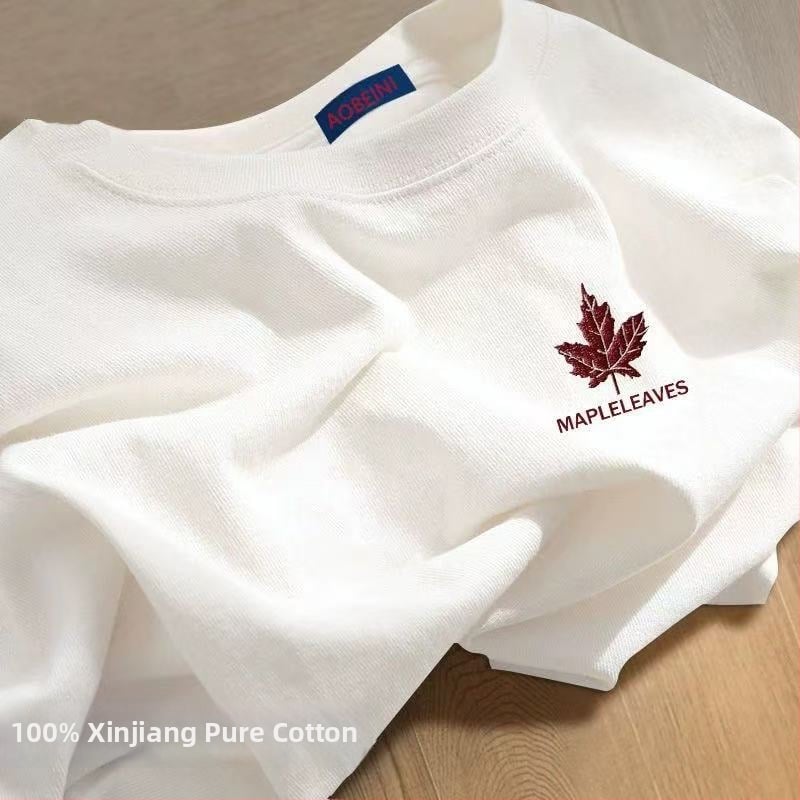 Sieviešu kokvilnas T-krekls ar apaļu kakla izgriezumu, īsiem piedurknēm, brīvā piegriezuma, ar teksta druku