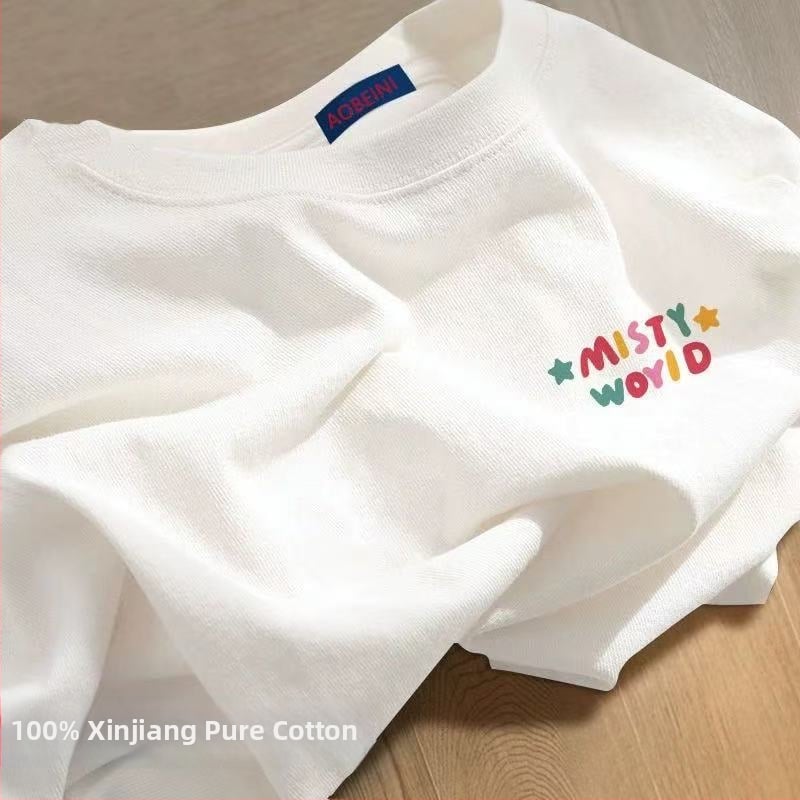 Sieviešu kokvilnas T-krekls ar apaļu kakla izgriezumu, īsiem piedurknēm, brīvā piegriezuma, ar teksta druku