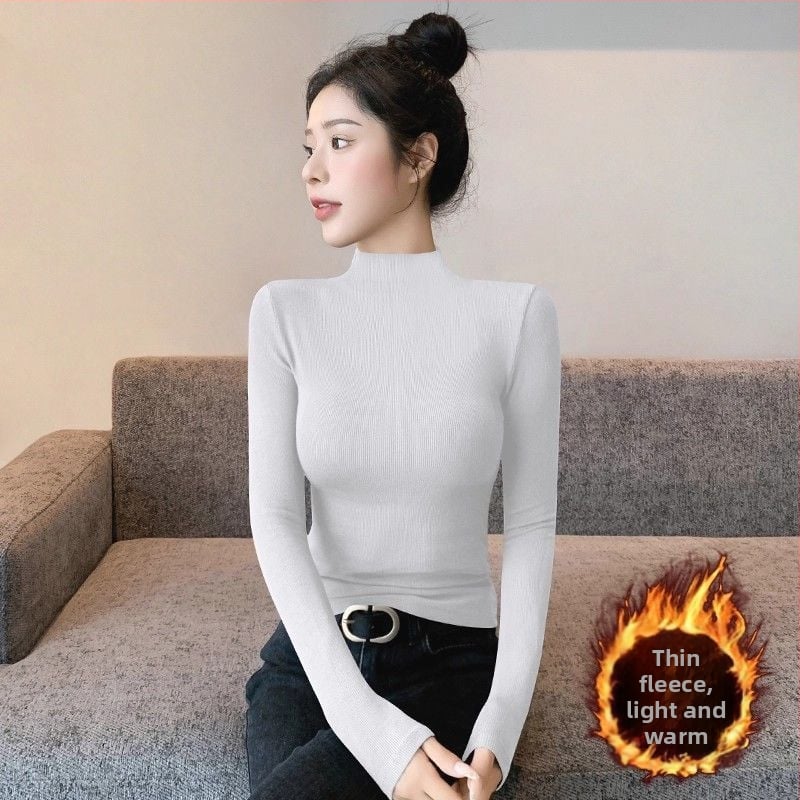 Oversized bez piedurknēm adīts tops ar pusi augstu kaklu un izšuvumu uz gludas auduma, pavasaris 2025