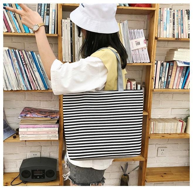 Atgriezeniska kanvas soma ar ielu stilu noskaņu, kompakta kvadrātveida pleca soma ar rāvējslēdzēja atvērumu un iekšējo rāvējslēdzēja kabatu