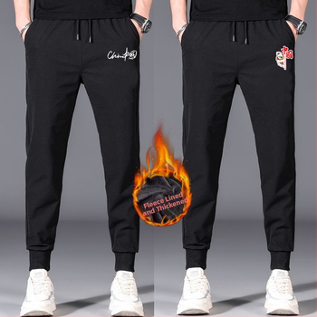 Flīša pildītas darba bikses ar brīvu piegriezumu, potītei aizsiets auklu, poliesteru audums