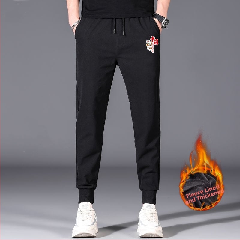 Flīša pildītas darba bikses ar brīvu piegriezumu, potītei aizsiets auklu, poliesteru audums