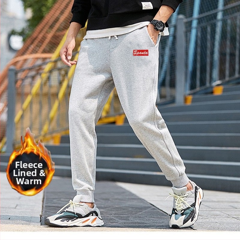 Flīša pildītas darba bikses ar brīvu piegriezumu, potītei aizsiets auklu, poliesteru audums