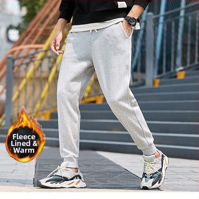 Flīša pildītas darba bikses ar brīvu piegriezumu, potītei aizsiets auklu, poliesteru audums