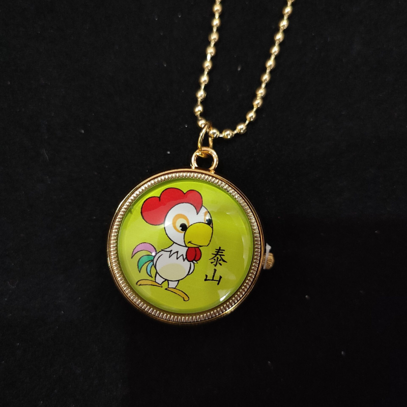 Rajzfilmszerű forgó zsebóra nyaklánc gyerekeknek, kvarc működés, kerek számlap, ötvözetes tok