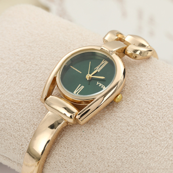 Sieviešu kvarca pulkstenis ar retro pogu dizainu, apaļš ciparnīcas diametrs 23 mm, biezums 12 mm, korpuss no cinka sakausējuma