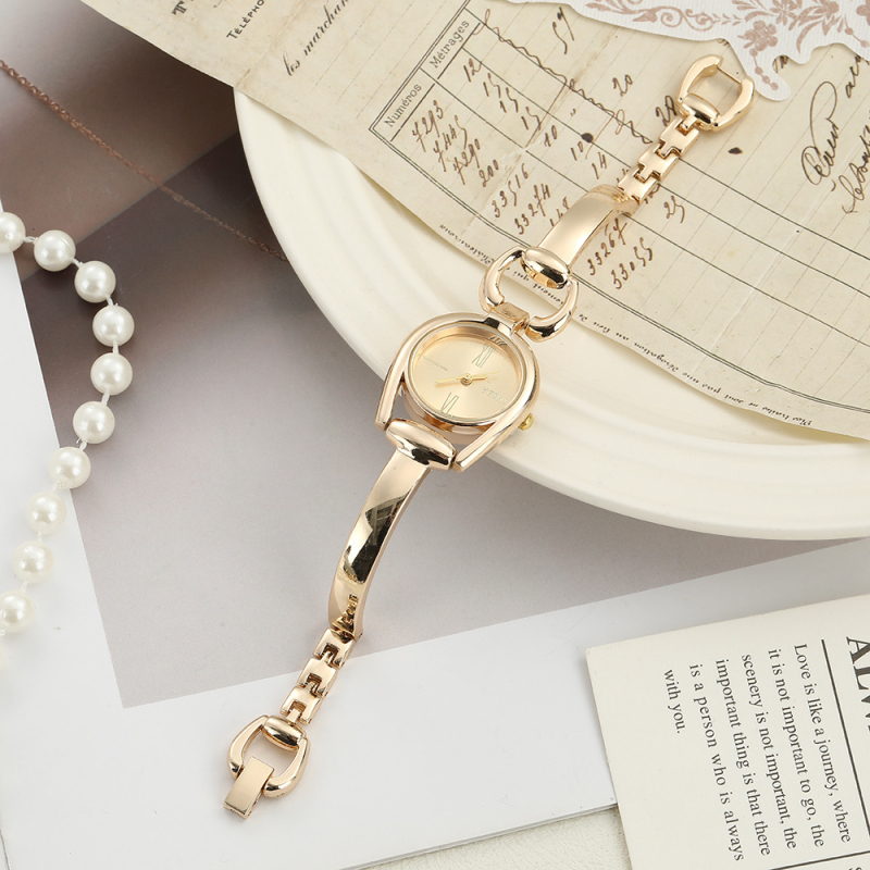 Sieviešu kvarca pulkstenis ar retro pogu dizainu, apaļš ciparnīcas diametrs 23 mm, biezums 12 mm, korpuss no cinka sakausējuma