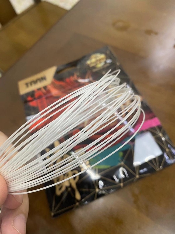 Badmintoni nöör nylonist, 0.66 mm läbimõõt, kõrge elastsus, mudel YYBG80, kaubamärk Taan