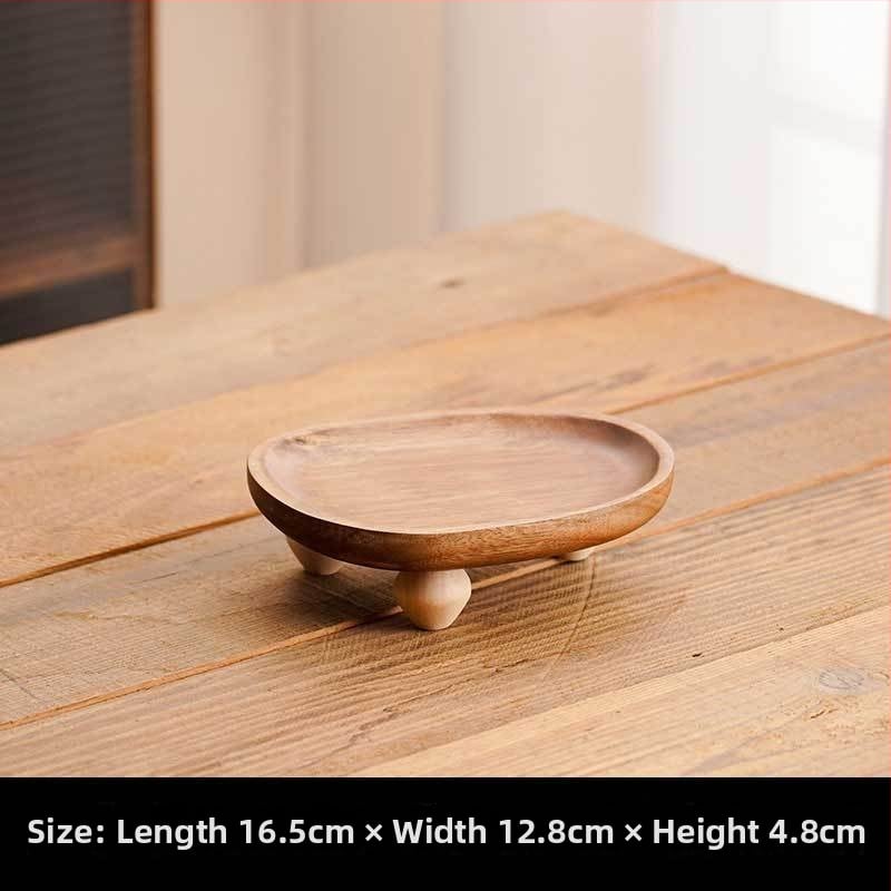 Koka trauks tējas tasēm, kafes piederumiem, rotaslietām un augļiem – ķīniešu stilā galda piederumi