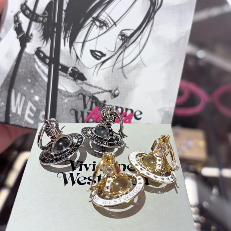 Nana közös márkájú nyaklánc Szaturnusz-plánéta medállal, keresztlánccal, réz medál, 31–40 cm hosszú