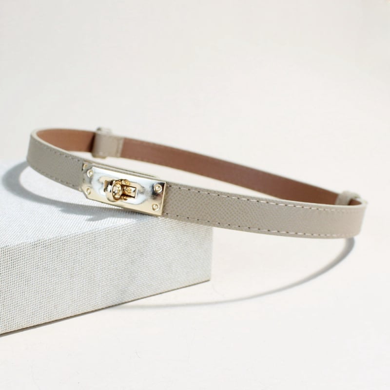 Sünteetilise naha vöö reguleeritava klamriga — õhuke, mitmekülgne sobib ülikonnale ja kleidile