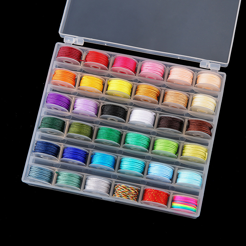 Dreamland DIY papuošalų rinkinys: nailoniniai siūlai pynimui apyrankėms ir karoliams; sidabro grynumas 925/800; metalo kokybė 9552.