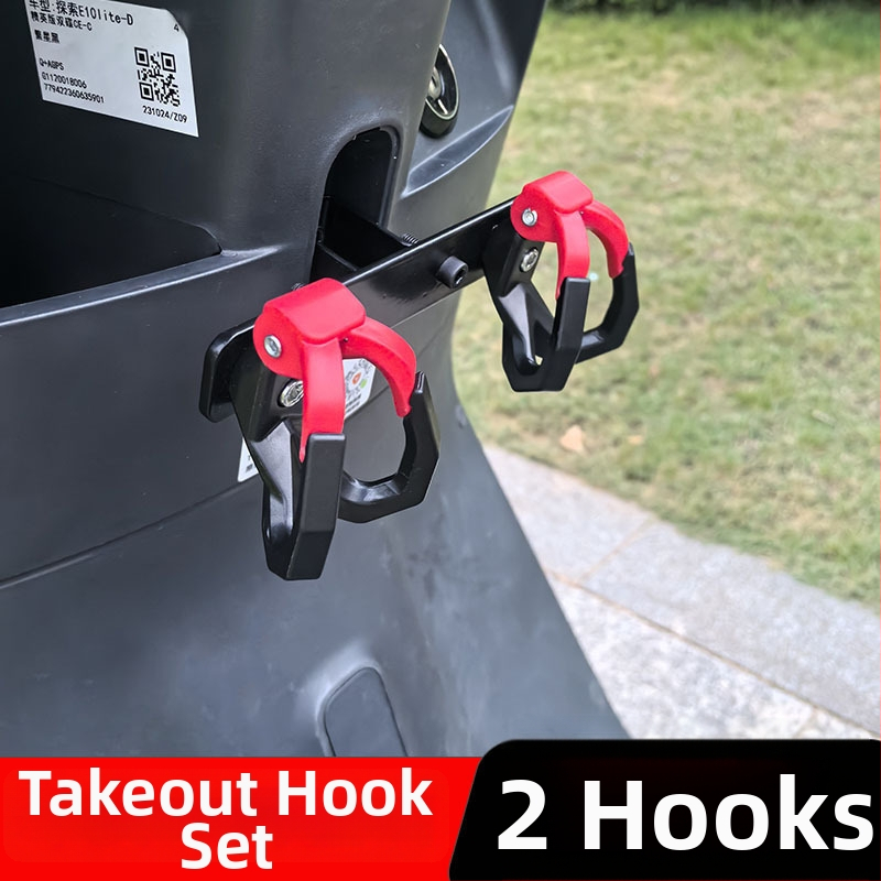 Elektrisko transportlīdzekļu āķis – dubultais āķis, plastmasa, slodze 15–20 kg, stiprināšana ar skrūvi