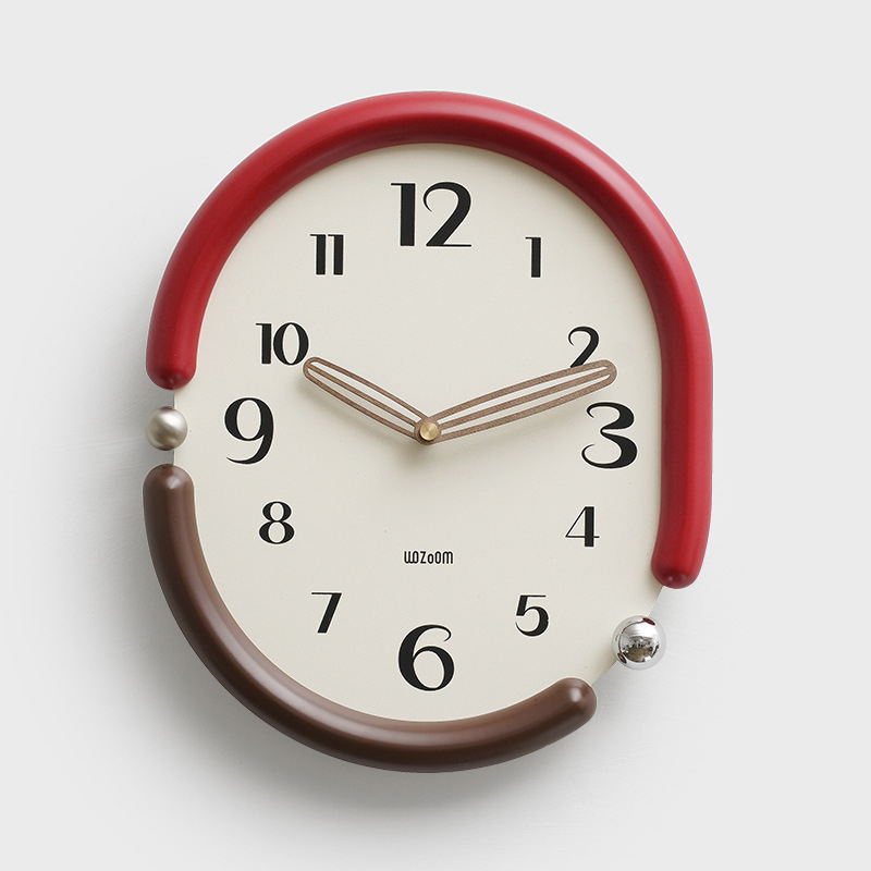 Sienas pulkstenis – ovāla forma, mūsdienīgs minimālisms, sekundes kustība (sweep), analogās rokas, darbojas ar baterijām