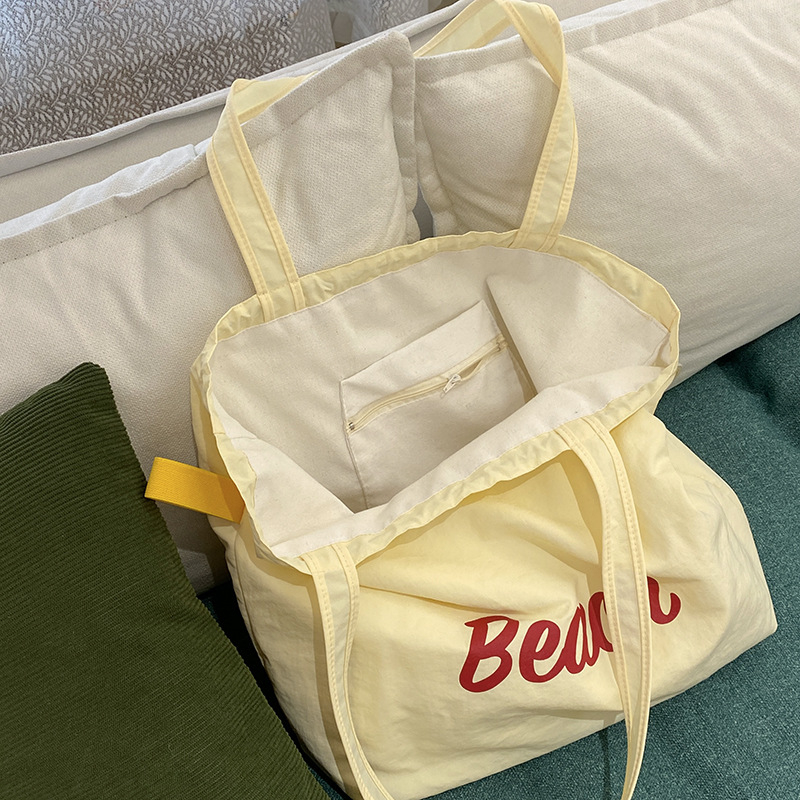 Nylon plecu soma ar šņorēm – pilsētas vienkāršs stils, iekšējā kabata ar rāvējslēdzēju un telefona kabatiņa, poliestera oderde