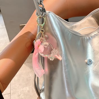 Képregényes kulcstartó, akril üvegben mozgó homokkal, gyerekek iskolatáskához