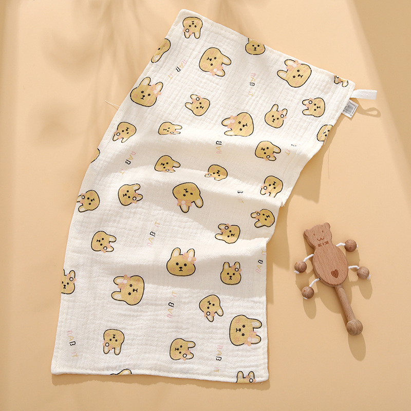 Bērnu dvielis, četru slāņu marle, ķemmēta diega, lāča karikatūras motīvs, ar drukātu logotipu, svars 40 g