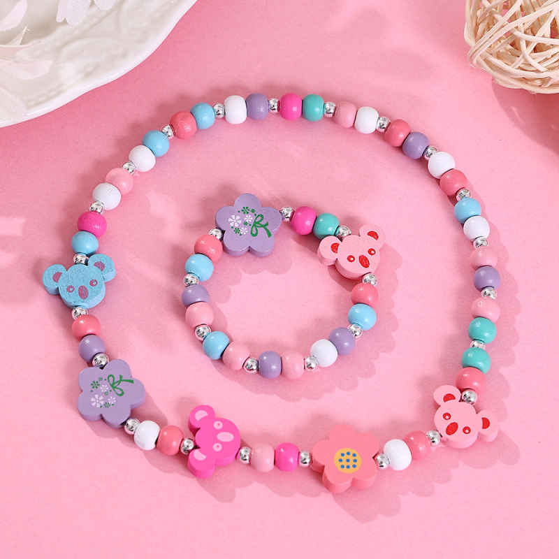 Set dječje ogrlice i narukvice od drvenih perli, cartoon stil • oslikana površina • kuglični lanac • oblik: dijete/životinja/zodijak