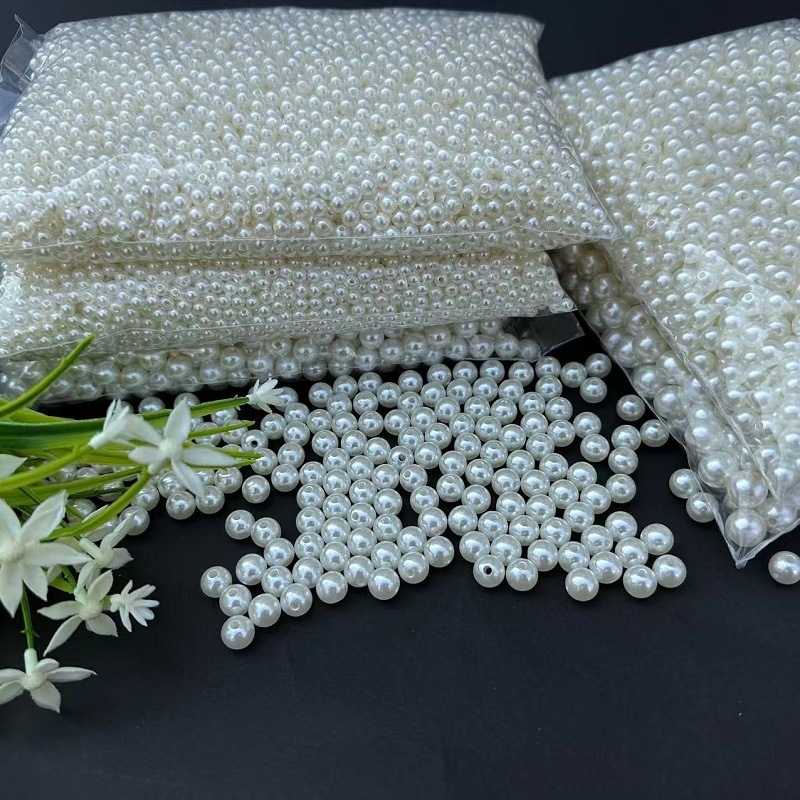 Labave perle od plastike/smole – pečene obojene, kružno perforirane perle
