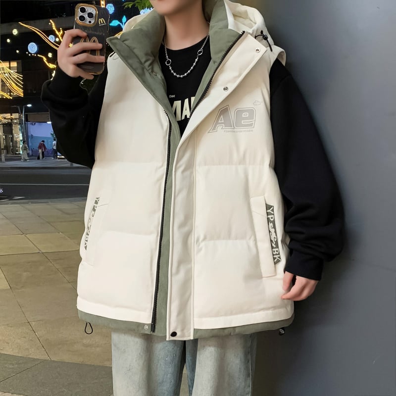 Fiatalos stílusú kapucnis mellény, laza szabás, cipzár, geometriai mintázat, tavasz–ősz