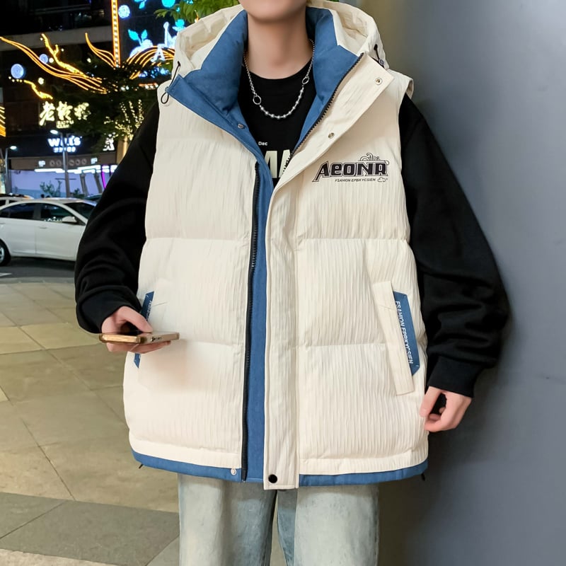 Fiatalos stílusú kapucnis mellény, laza szabás, cipzár, geometriai mintázat, tavasz–ősz