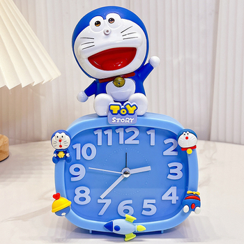 Bērniem paredzēts galda pulkstenis – karikatūru stilā, ar baterijām, izturīgs pret kritieniem (plastmasas korpuss, plastmasas cifernis)