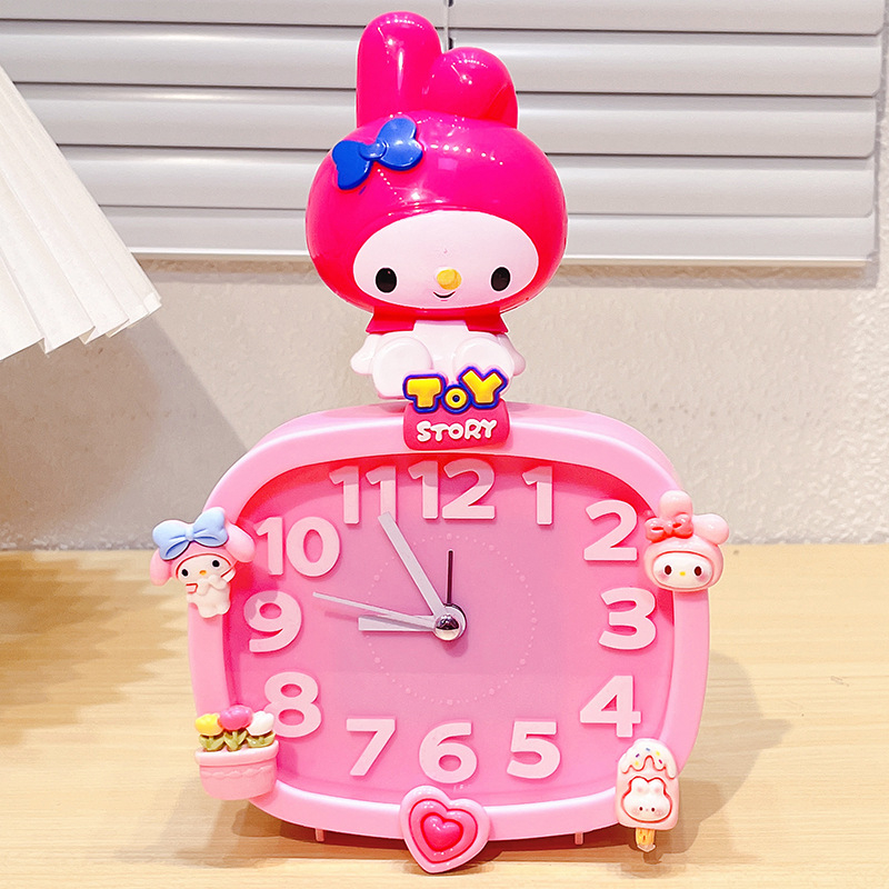 Bērniem paredzēts galda pulkstenis – karikatūru stilā, ar baterijām, izturīgs pret kritieniem (plastmasas korpuss, plastmasas cifernis)