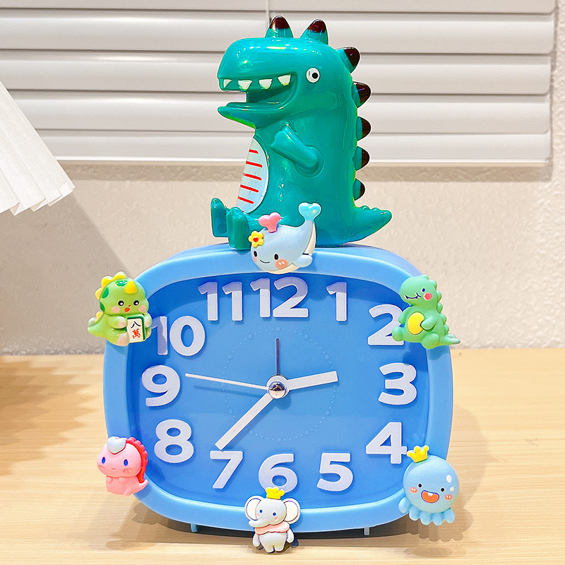 Bērniem paredzēts galda pulkstenis – karikatūru stilā, ar baterijām, izturīgs pret kritieniem (plastmasas korpuss, plastmasas cifernis)