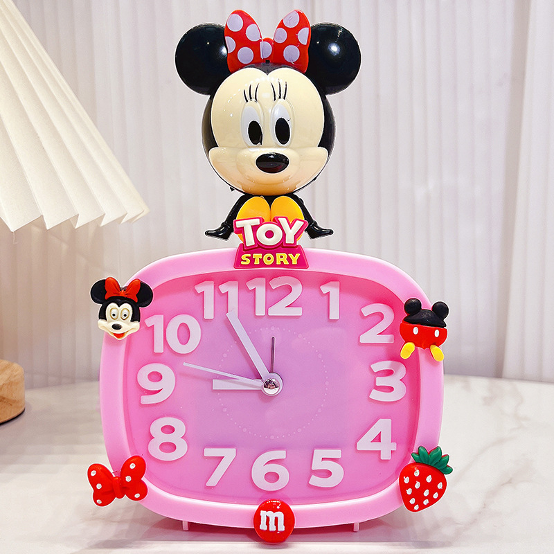 Bērniem paredzēts galda pulkstenis – karikatūru stilā, ar baterijām, izturīgs pret kritieniem (plastmasas korpuss, plastmasas cifernis)