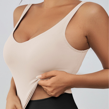 Sporta krūšturis skrējienam un jogai, bez stieplēm, ar noņemamiem pildījumiem, platām plecu siksnām, īss griezums, materiāls: neilons (poliamīds)