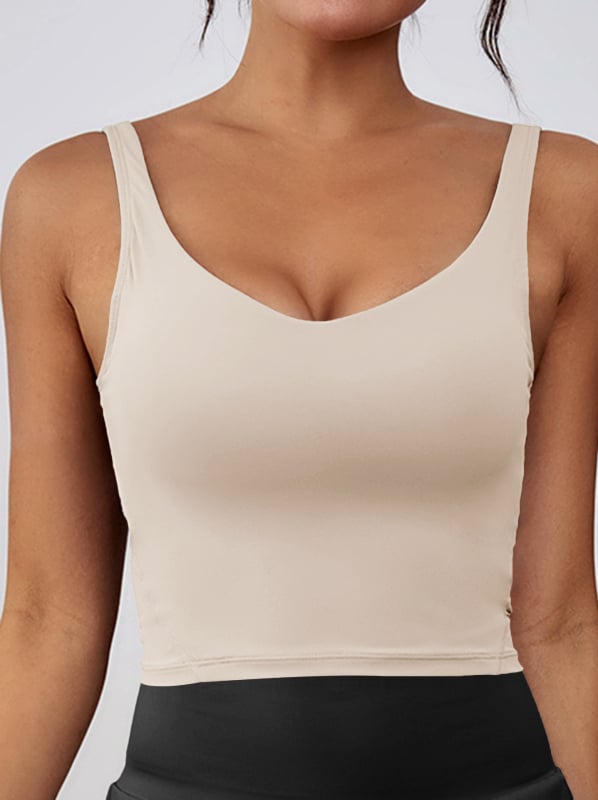 Sporta krūšturis skrējienam un jogai, bez stieplēm, ar noņemamiem pildījumiem, platām plecu siksnām, īss griezums, materiāls: neilons (poliamīds)