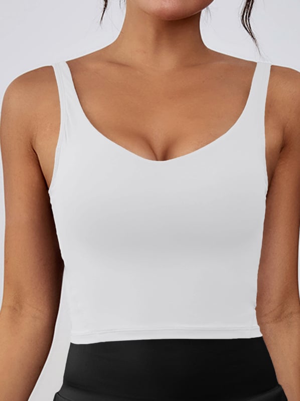 Sporta krūšturis skrējienam un jogai, bez stieplēm, ar noņemamiem pildījumiem, platām plecu siksnām, īss griezums, materiāls: neilons (poliamīds)