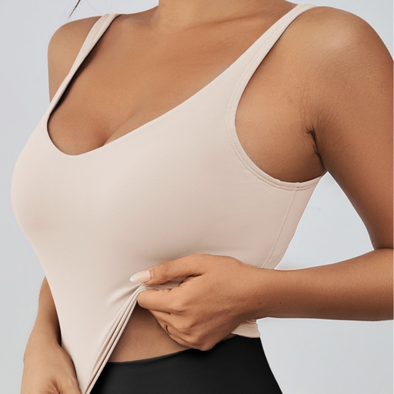 Sporta krūšturis skrējienam un jogai, bez stieplēm, ar noņemamiem pildījumiem, platām plecu siksnām, īss griezums, materiāls: neilons (poliamīds)